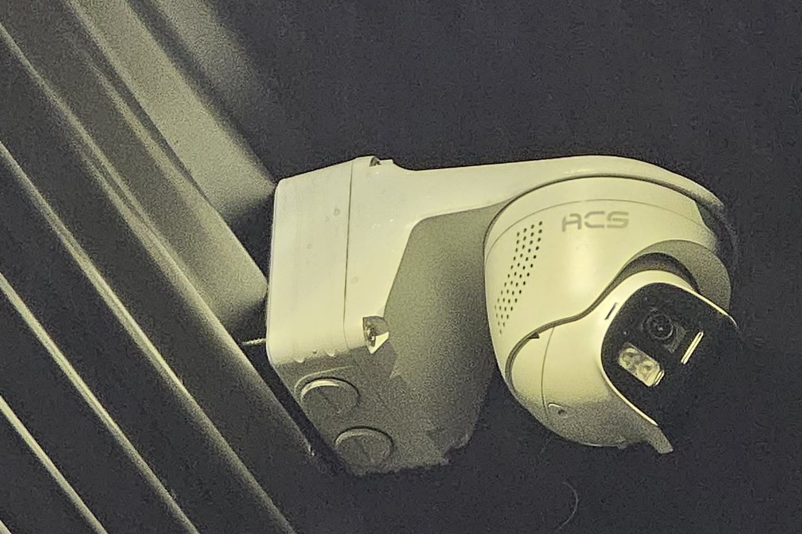 An ACS camera head mounted on a building, seen close