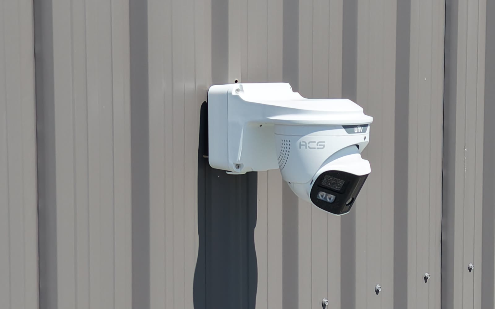 An ACS fixed camera mounted on a building wall