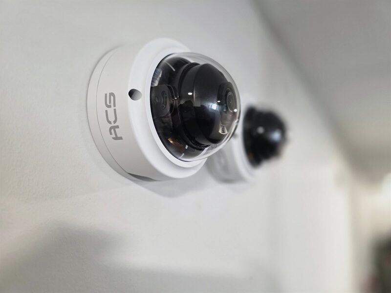 ACS-branded dome camera, close up