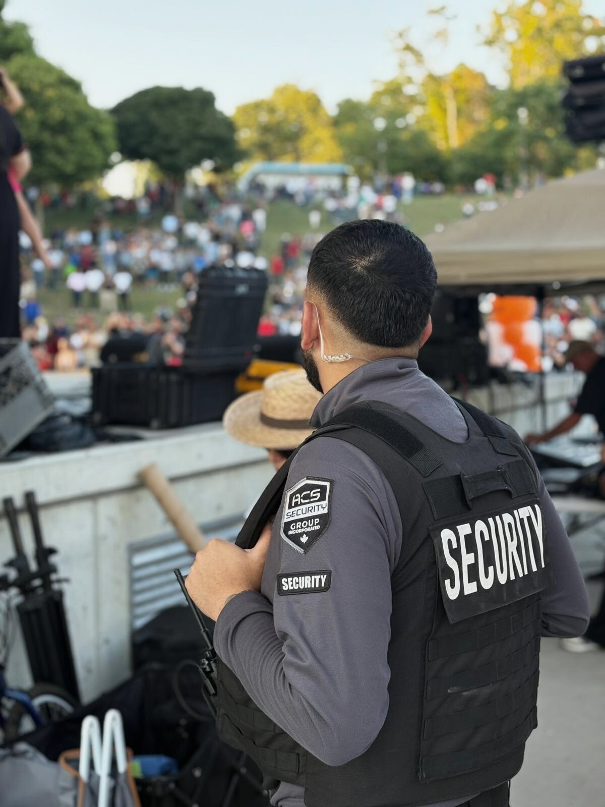 ACS guards supporting a daytime community gathering