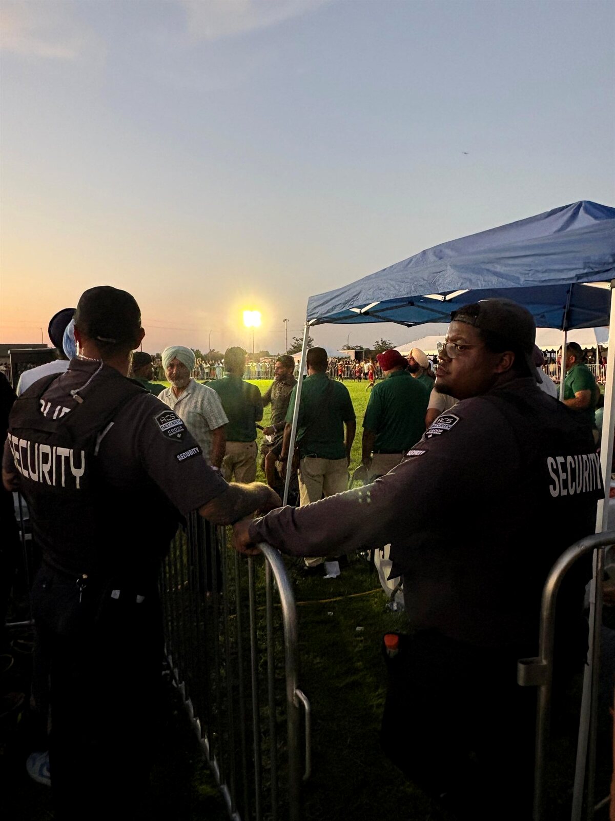 ACS team working an outdoor event at sunset