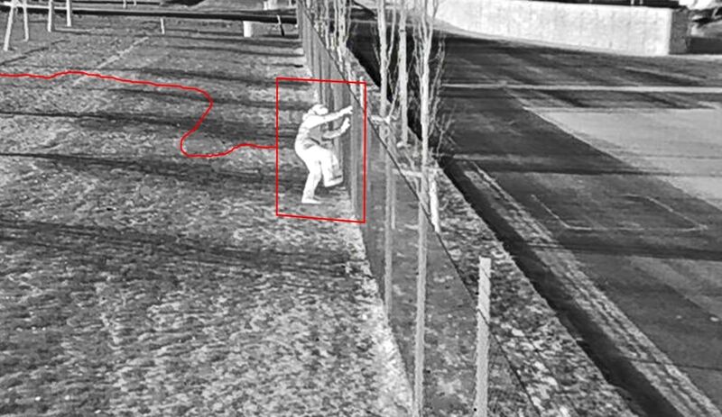 ACS AI camera detecting a person at a property perimeter, highlighted with a detection box