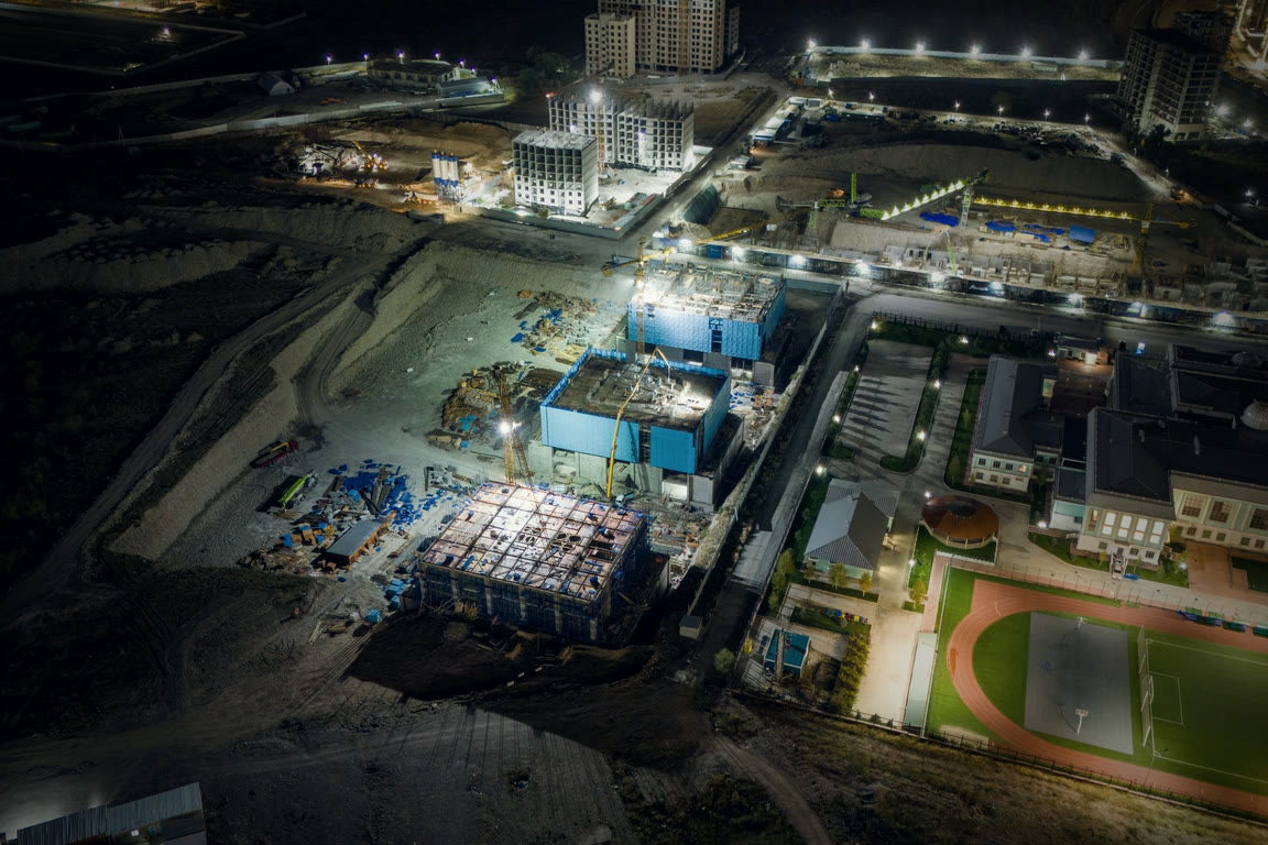 A construction site lit and empty after the crew has left for the night