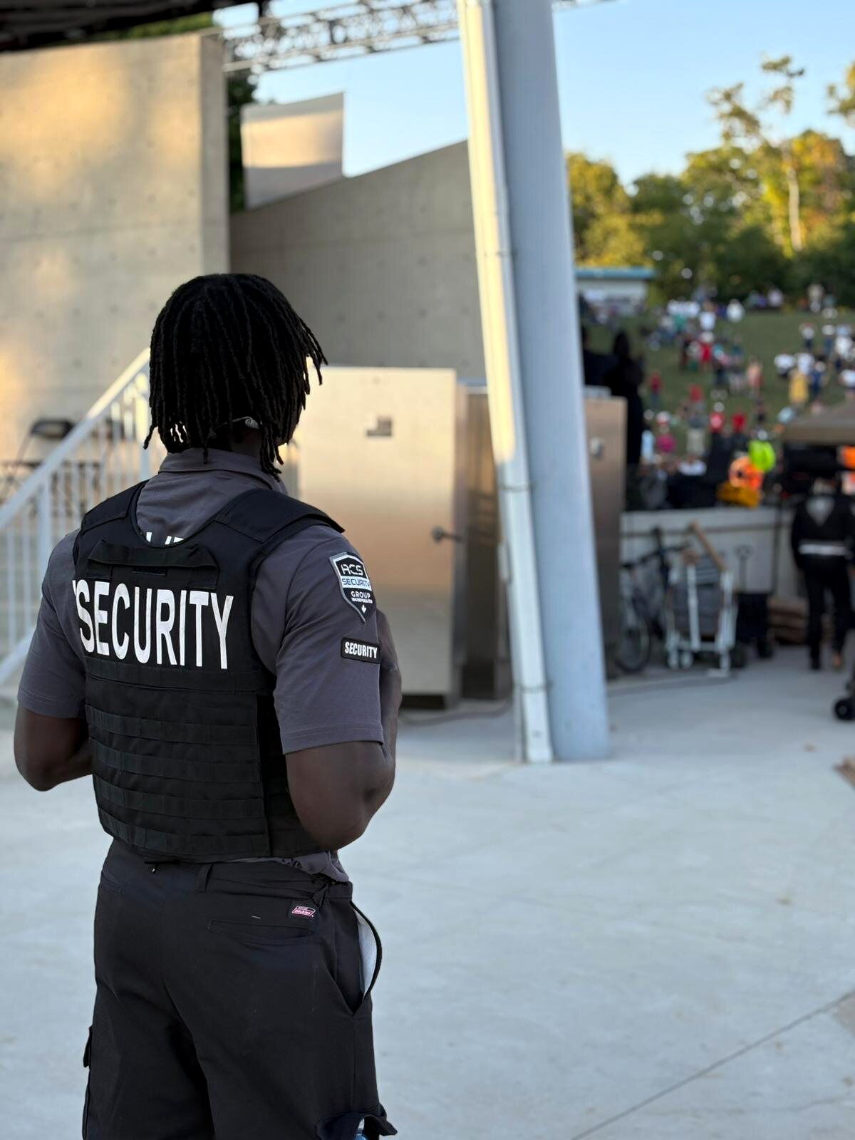 ACS security guard on detail at an outdoor event