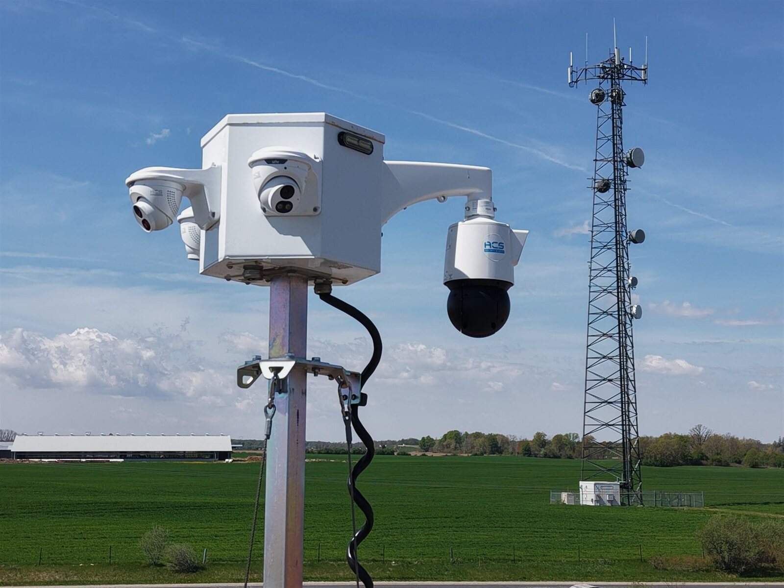 Aerial view of an ACS mobile defense tower watching over a wide industrial yard