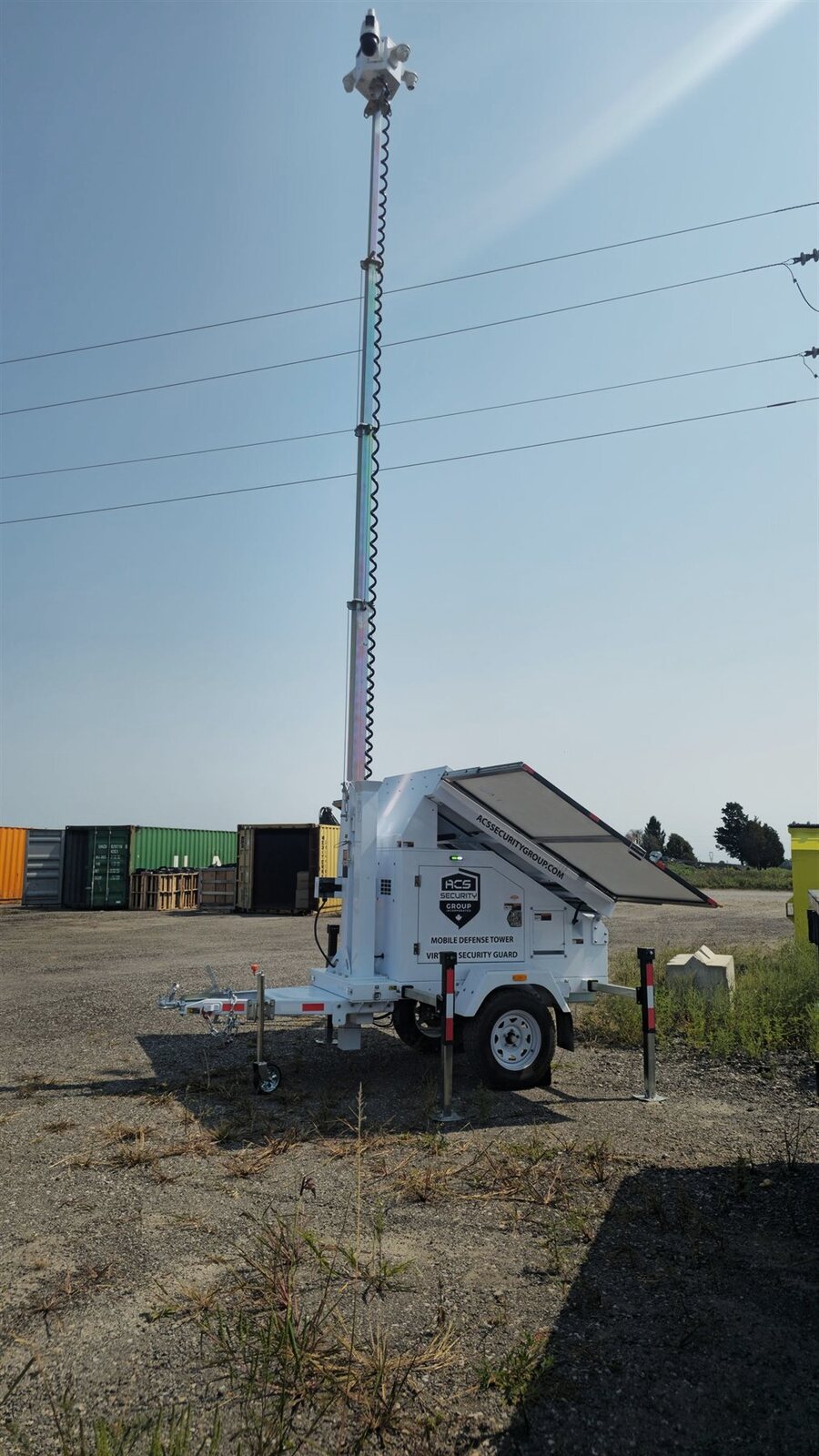 ACS mobile defense tower extending coverage beside guard patrols
