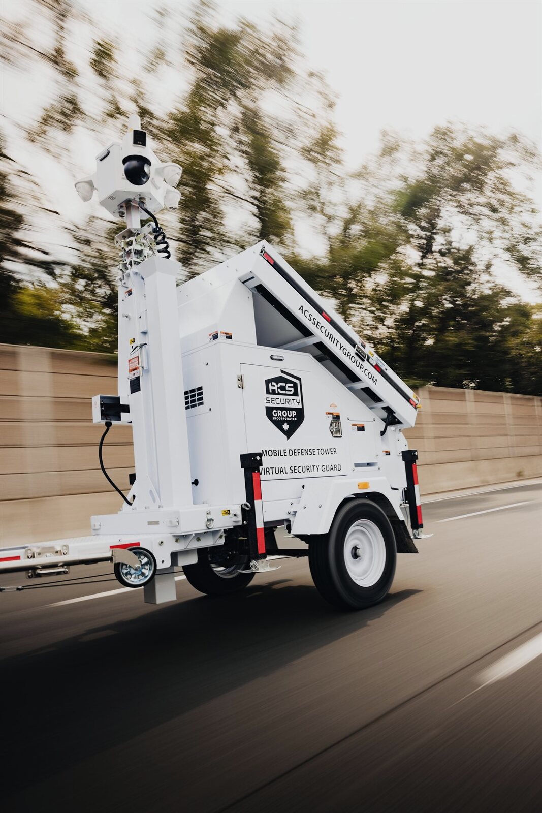 ACS mobile defense tower covering an open lot at a remote site